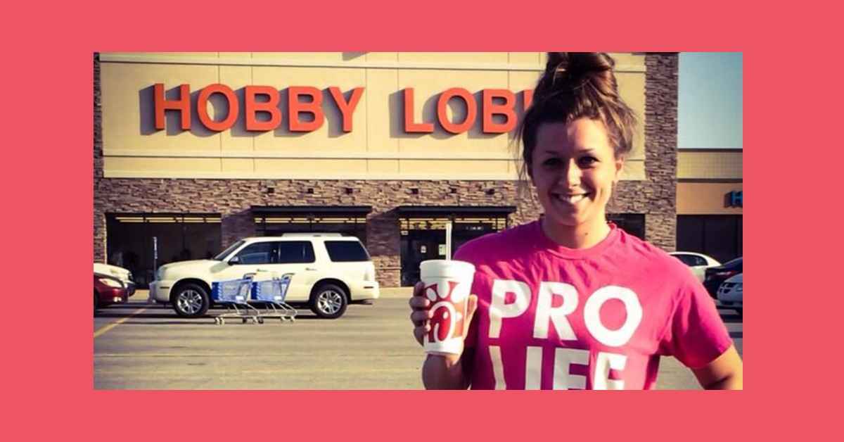 hobby lobby background with a girl holding glass